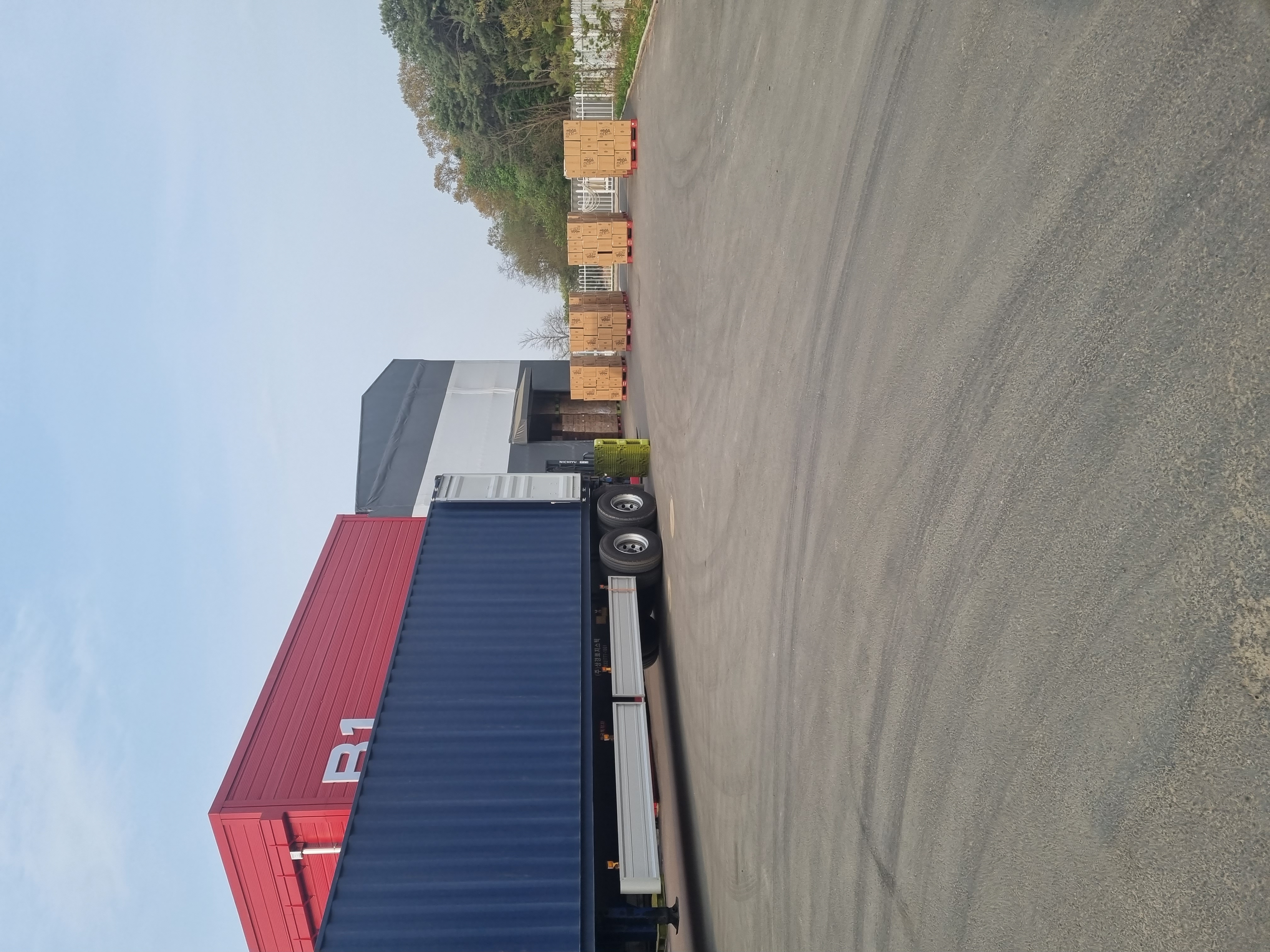 Container-side shipment handoff